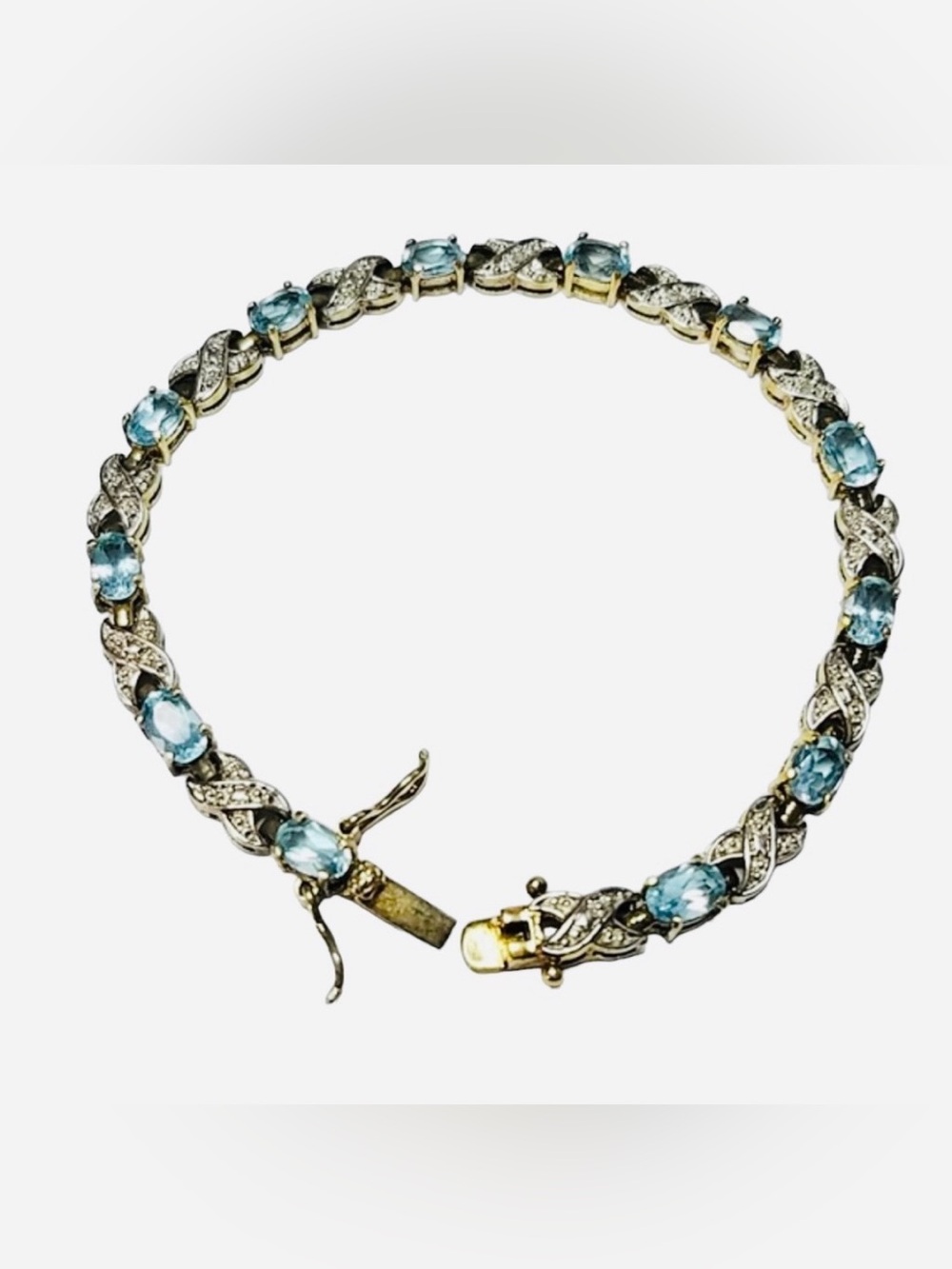 Sterling Silver Swiss Blue Topaz 14 Stone Tennis Bracelet Open Criss Cross X